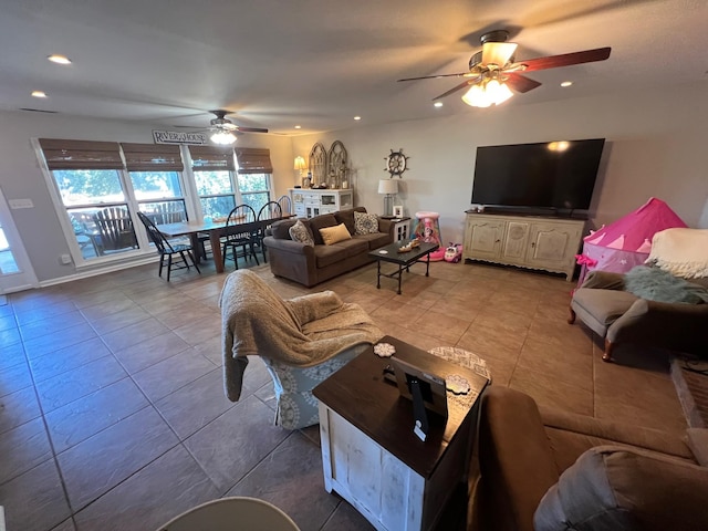 tiled living area featuring recessed lighting and a ceiling fan