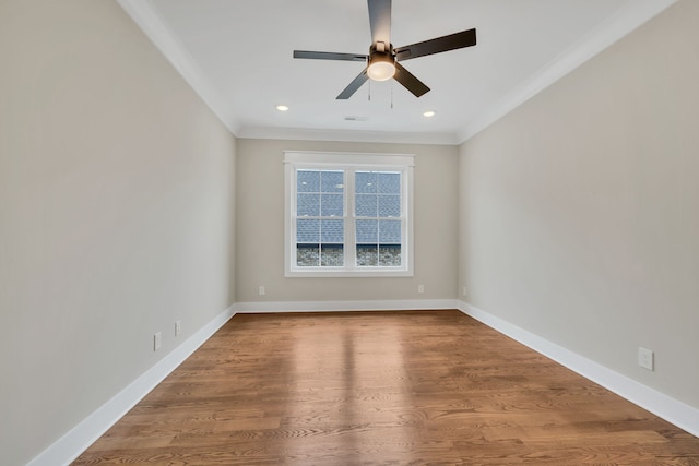 unfurnished room with crown molding, hardwood / wood-style flooring, and ceiling fan