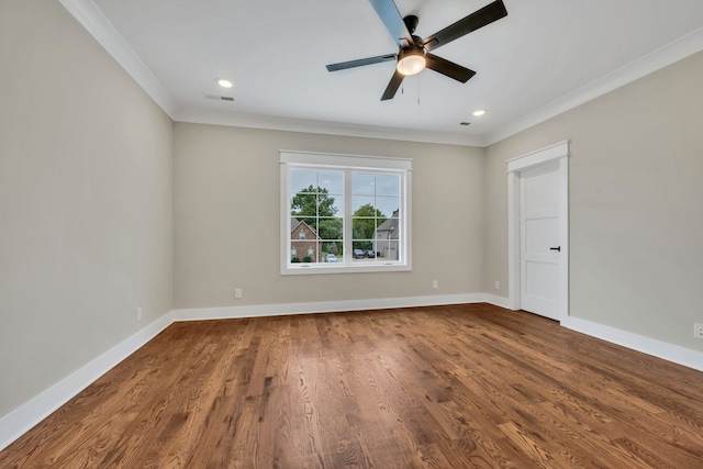 spare room with crown molding, hardwood / wood-style floors, and ceiling fan