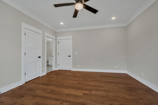 unfurnished room with ornamental molding, dark wood-type flooring, and ceiling fan