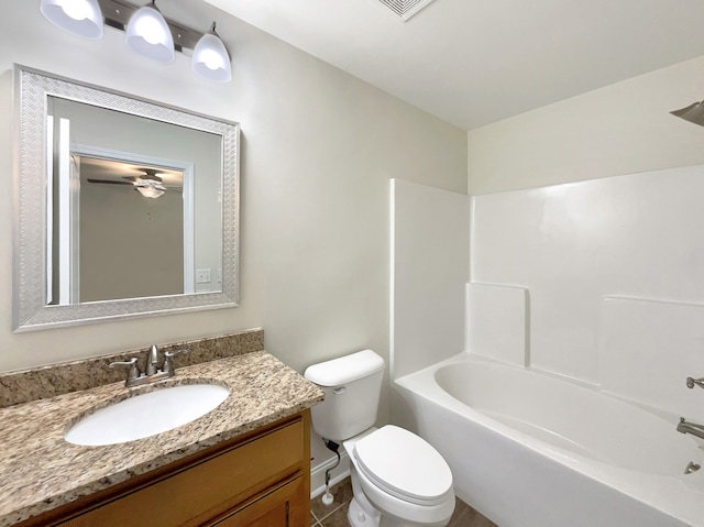 full bathroom with tile patterned flooring, shower / bath combination, vanity, and toilet