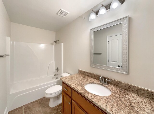 full bathroom with shower / bathing tub combination, tile patterned floors, vanity, and toilet