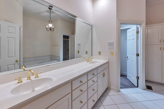 bathroom with a chandelier, tile patterned floors, separate shower and tub, ornamental molding, and vanity