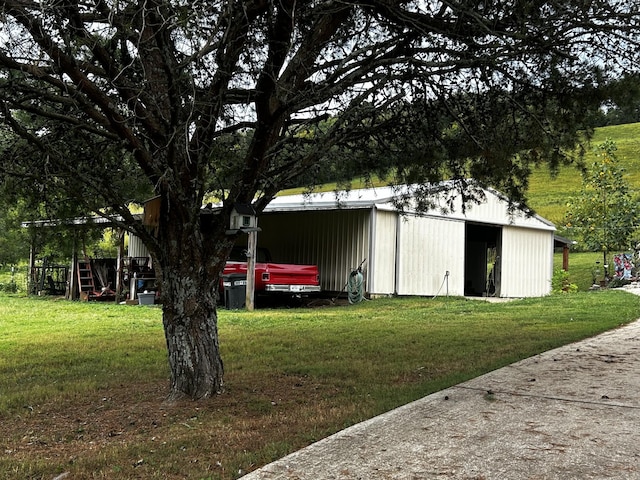 315 Loyd Rd, Pulaski, TN 38478 - view of pole building with a yard