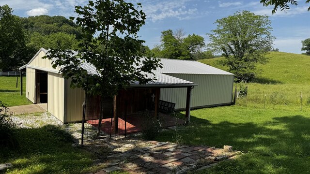 315 Loyd Rd, Pulaski, TN 38478 - view of pole building with a lawn