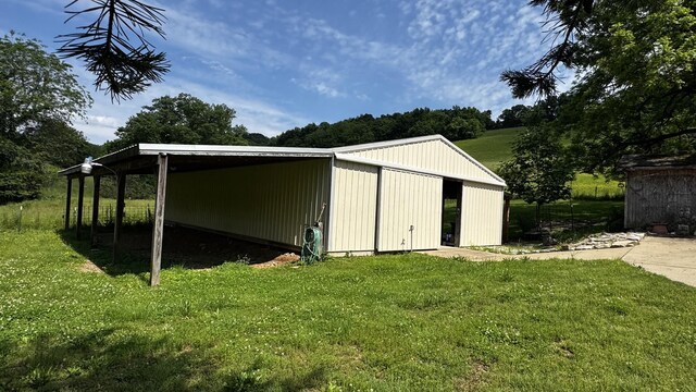 315 Loyd Rd, Pulaski, TN 38478 - view of pole building with a lawn