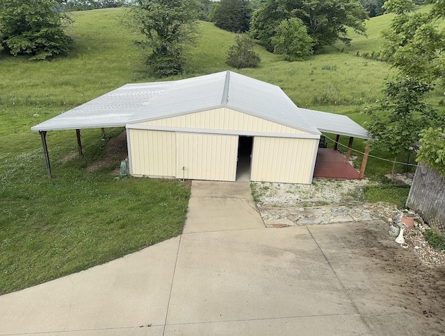 315 Loyd Rd, Pulaski, TN 38478 - view of pole building featuring a lawn