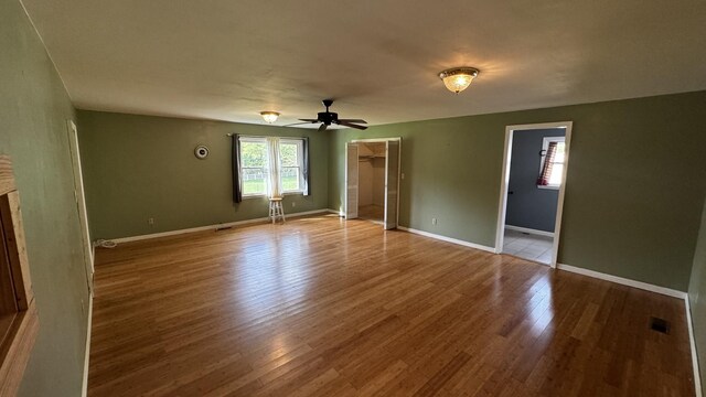 315 Loyd Rd, Pulaski, TN 38478 - empty room with wood finished floors and a ceiling fan