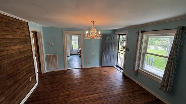 315 Loyd Rd, Pulaski, TN 38478 - entryway with a chandelier, healthy amount of natural light, dark wood-type flooring, and crown molding