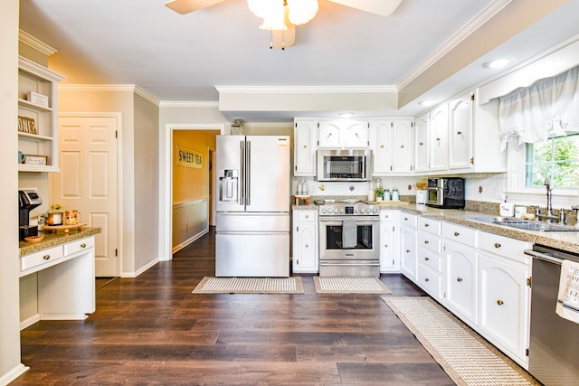 kitchen featuring white cabinetry, dark wood-type flooring, stainless steel appliances, crown molding, and ceiling fan