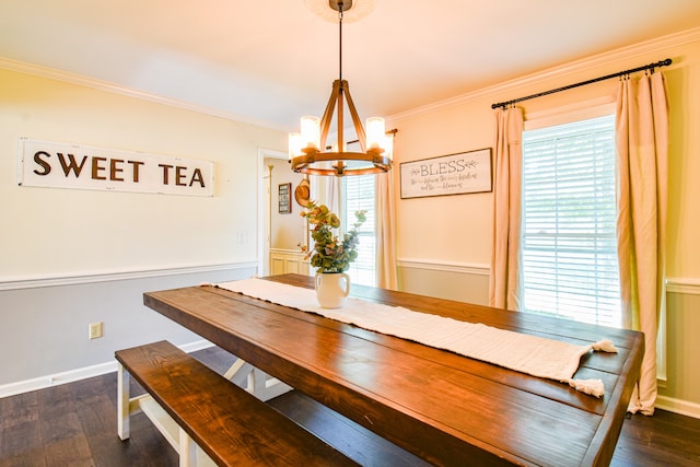 unfurnished dining area featuring an inviting chandelier, ornamental molding, and dark hardwood / wood-style flooring