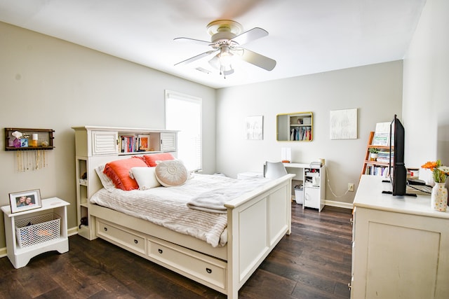 bedroom featuring ceiling fan and dark hardwood / wood-style floors