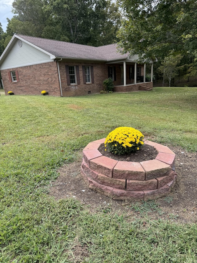 exterior space featuring a front lawn