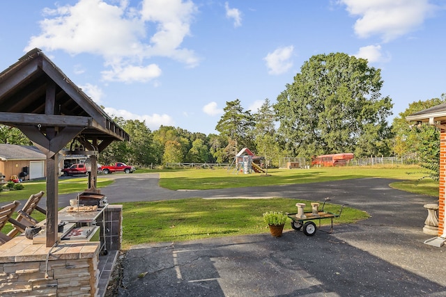 view of yard with a playground