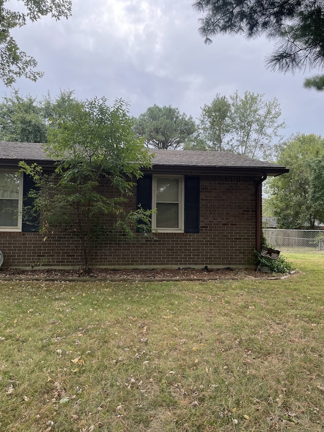 exterior space featuring a yard