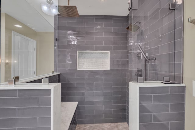 bathroom featuring a tile shower