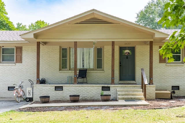 view of front of property featuring covered porch