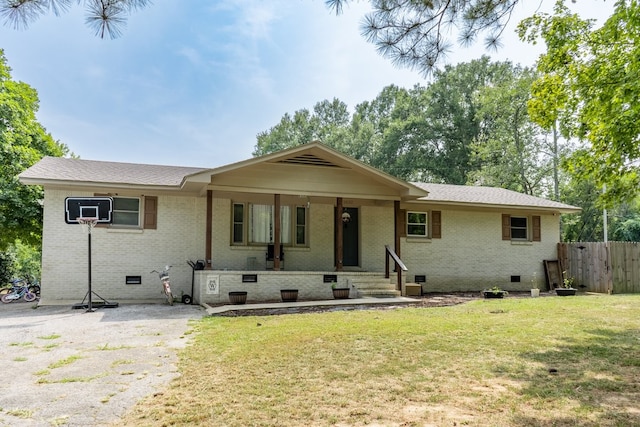 ranch-style home with a front yard