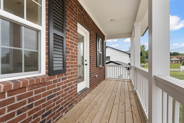 wooden deck with a porch