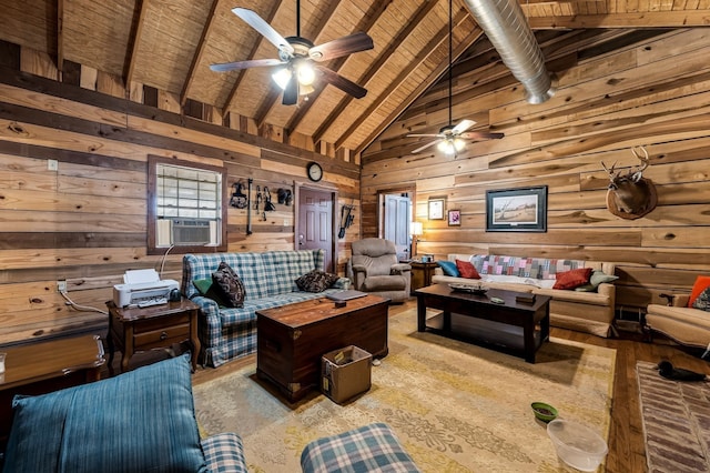 living room with wood ceiling, wood walls, ceiling fan, and beamed ceiling