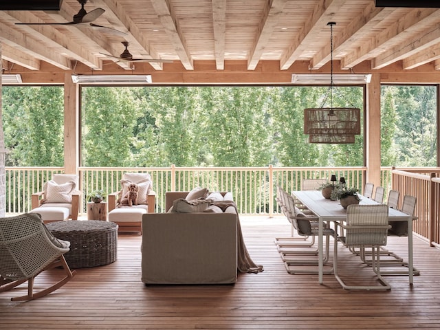 wooden deck with ceiling fan and an outdoor hangout area