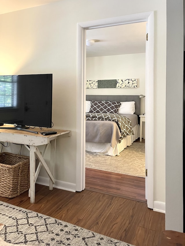 bedroom featuring hardwood / wood-style flooring