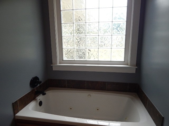 bathroom featuring a bath