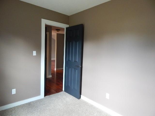 unfurnished bedroom with carpet