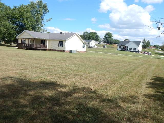 view of yard with a deck