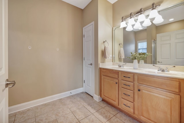 bathroom featuring vanity and tile patterned flooring