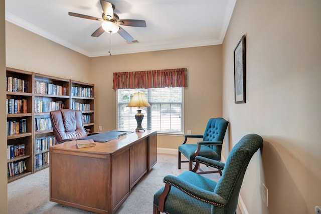 office area featuring ceiling fan, light colored carpet, and crown molding