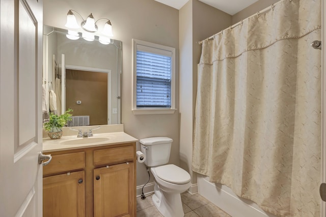 full bathroom featuring shower / bath combination with curtain, vanity, tile patterned flooring, and toilet