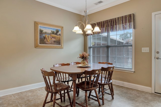 dining space featuring an inviting chandelier, plenty of natural light, and ornamental molding