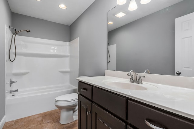 full bathroom with toilet, vanity, tile patterned floors, and tub / shower combination