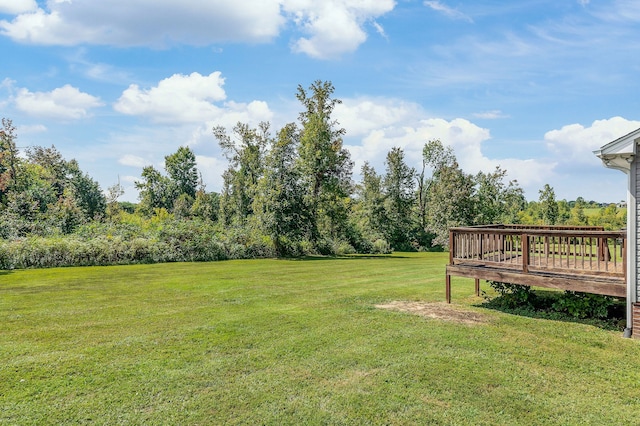 view of yard with a deck