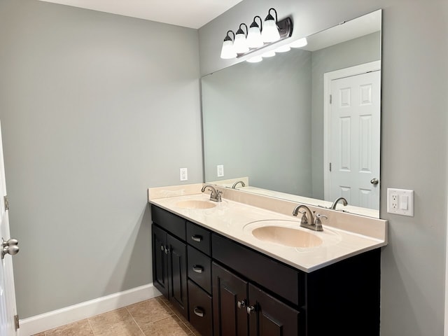 bathroom with vanity and tile patterned flooring