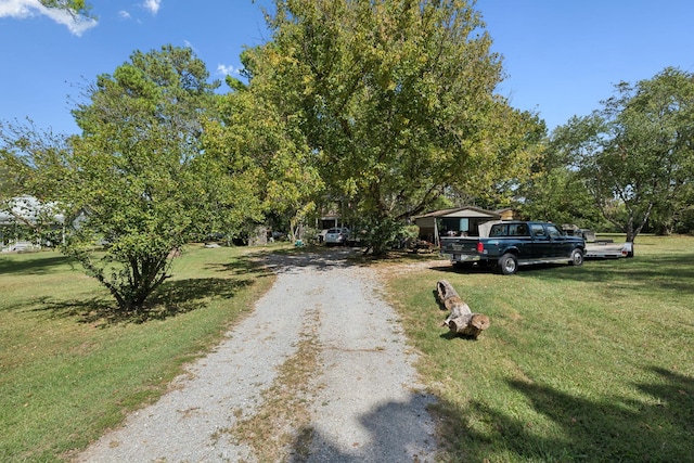 138 W Division St, Mount Juliet, TN 37122 - view of front facade featuring driveway and a front yard
