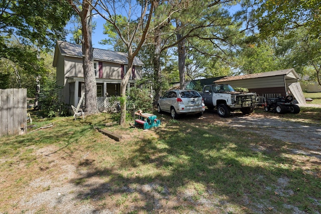 exterior space with a carport