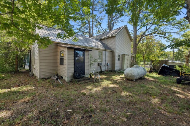 138 W Division St, Mount Juliet, TN 37122 - rear view of property with a metal roof