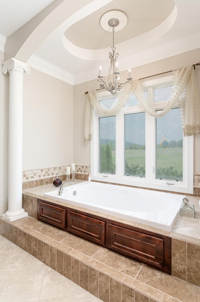 bathroom with crown molding and a relaxing tiled tub