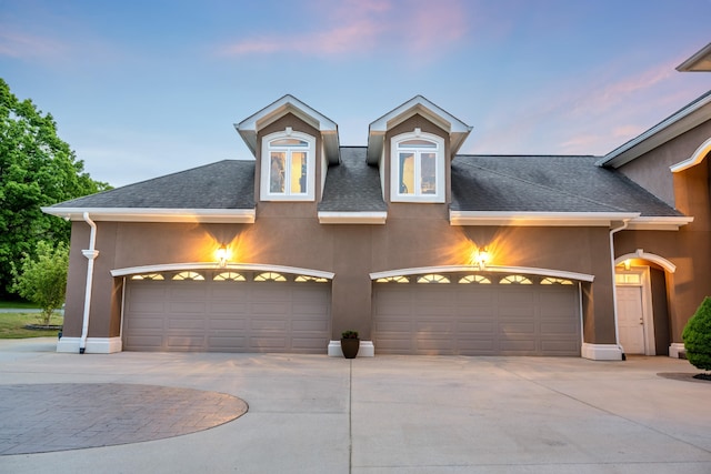 view of front of home featuring a garage