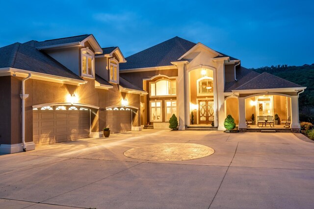 view of front of property with a garage