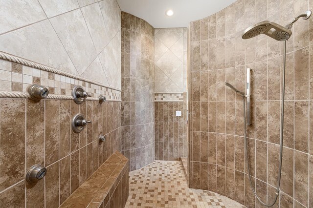 bathroom featuring tiled shower