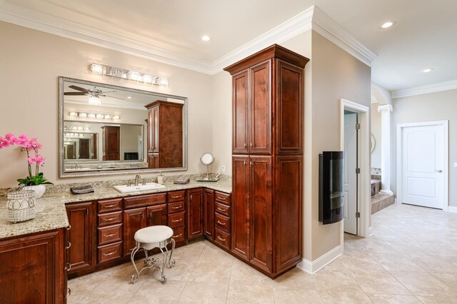 bathroom featuring crown molding, tile patterned flooring, vanity, and ceiling fan