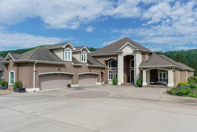 view of front of property featuring a garage