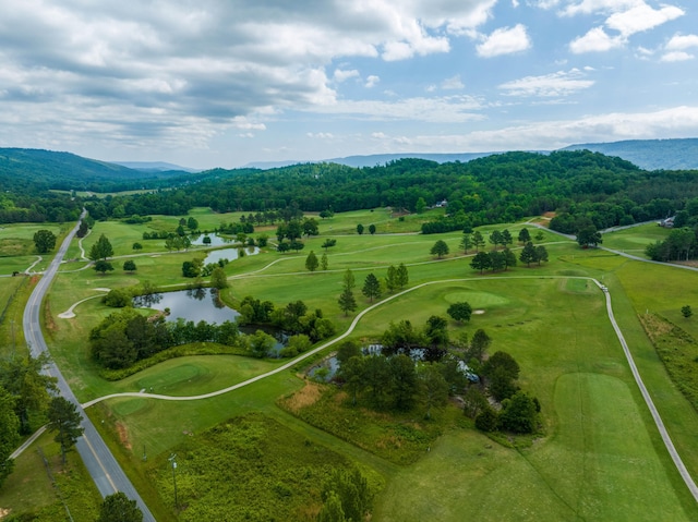 bird's eye view with a water and mountain view