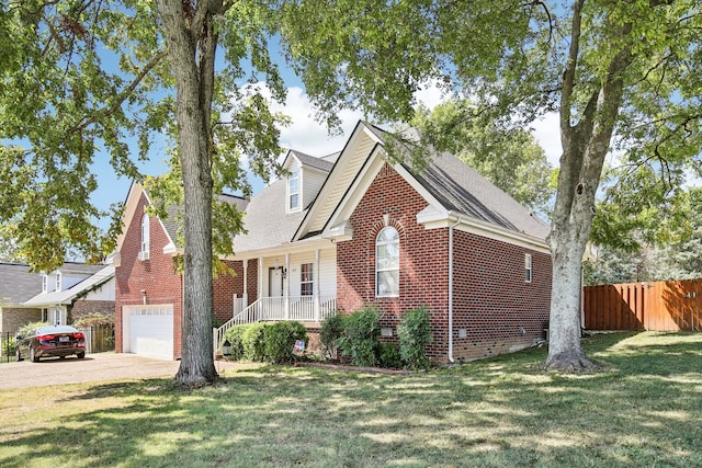 view of front of home featuring a front lawn and covered porch