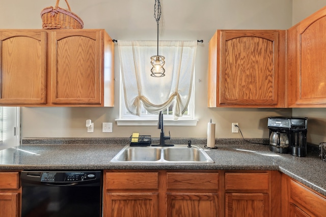 kitchen featuring sink, dishwasher, and pendant lighting