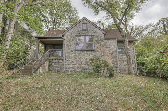 view of property exterior featuring a yard