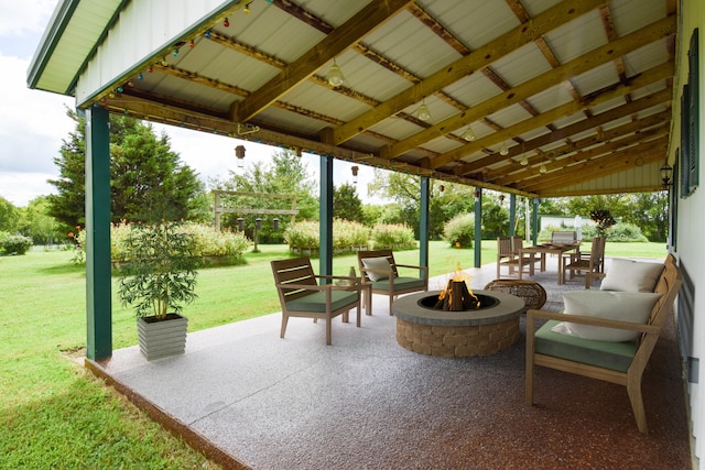 view of patio featuring a fire pit